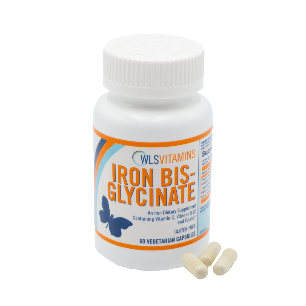 A bottle of Iron Bis-Glycinate supplements with some capsules visible in front of the bottle.